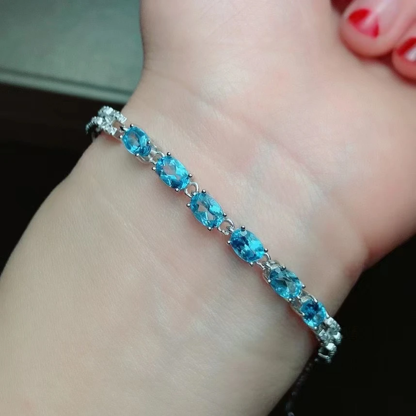 KJJEAXCMY fine jewelry 925 sterling silver inlaid Natural Swiss blue topaz women simple fashion oval gem hand bracelet support d