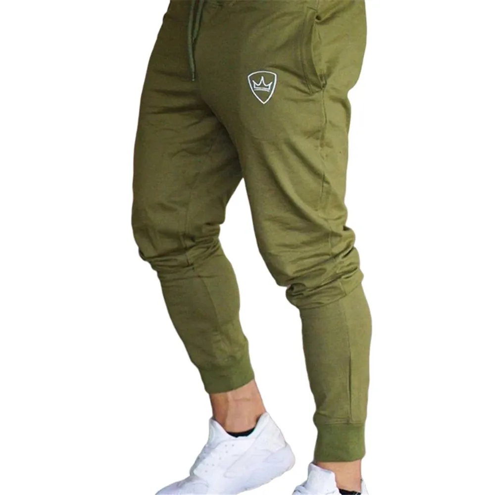 جوجرس الرجال أربعة مواسم Sweatpants الصلبة اللياقة البدنية رياضية تجريب السراويل الرباط سروال شكل قلم رصاص خفيفة الوزن بناطيل كاجوال