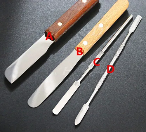 

Dental Lab Spatula Stainless Steel with Wooden Handle Cement Mixing Spatula Blade Instrument Tool 4 models