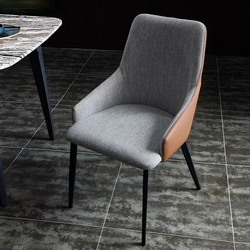 

Nordic light luxury dining chair Modern minimalist stool backrest soft chair Model room designer chair Wrought iron hotel chair