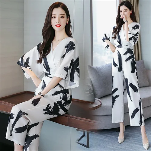 Hot Trendy Jumpsuits ออกแบบใหม่ Batwing เสื้อแขนยาว OL สไตล์สุภาพสตรีแฟชั่นลาย Jumpsuits