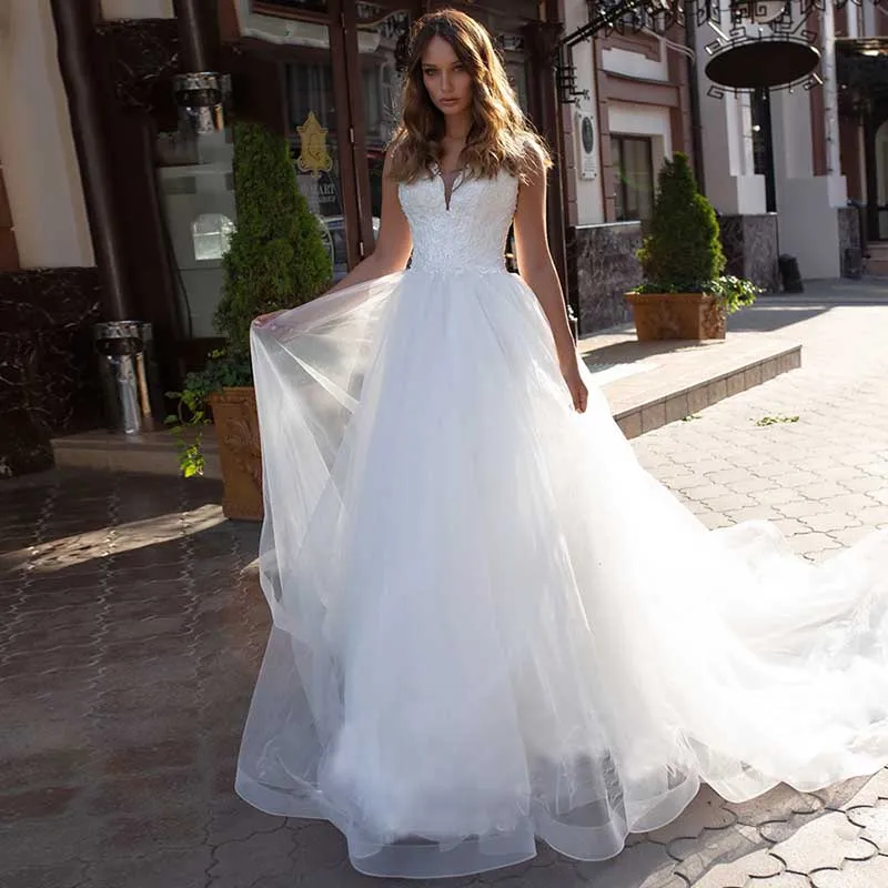 Vestido De novia blanco bohemio con cuello en V, traje De novia De tul con Apliques De encaje sin mangas, espalda descubierta y botones