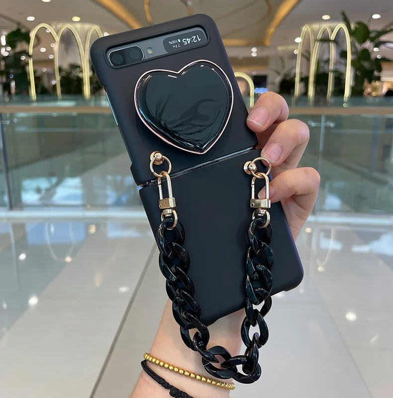 

Fashion Cool Black Phone Case Bracelet Hand Chain For Samsung Galaxy Z Flip 5 4 3 Flip3 5G Cute Love Heart Stand Holder Cover