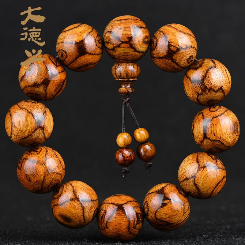 Senior authentic solitary Hainan Huanghua pear hand string eye to ghost face sea yellow Dalbergia yellow sandalwood Buddha beads