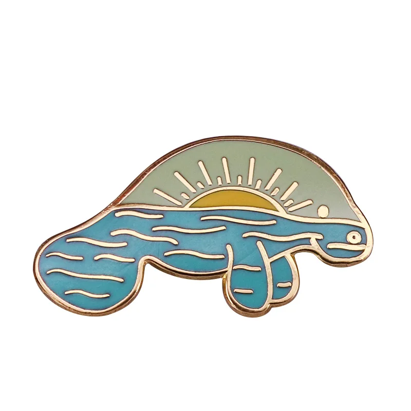 Gentle giants brooch This playful manatee is enjoying the Florida sunrise in his natural habitat!