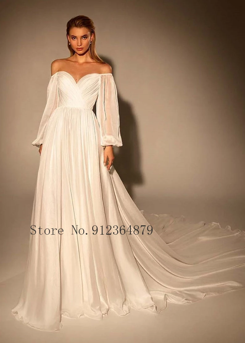 Robe de mariee Vestidos de novia de playa 2022 Mangas abullonadas Apliques de flores Cariño Una línea Vestidos de novia de tul