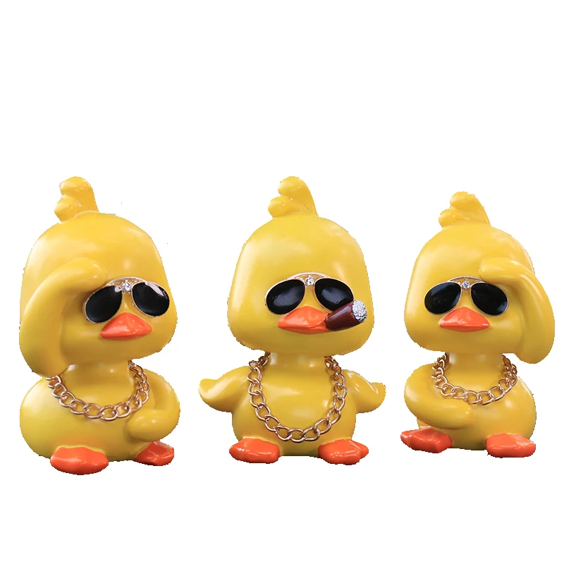 Little yellow duck car interior decoration ornaments car cute car shaking head doll car creative