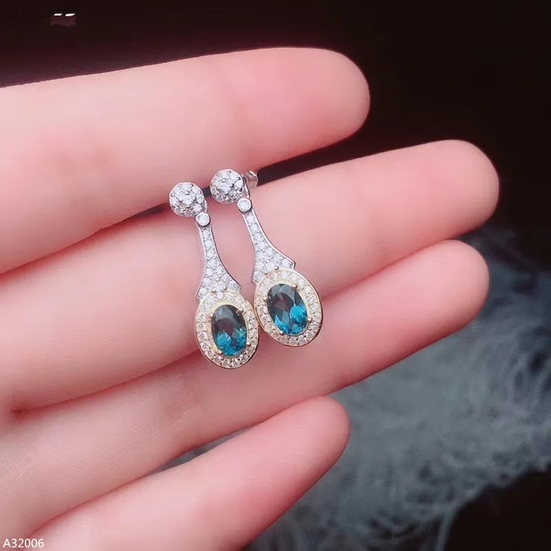 

Jewelry 925 sterling silver natural blue topaz gemstone girl earrings micro-set luxury fashion new faceted ellipse can be review