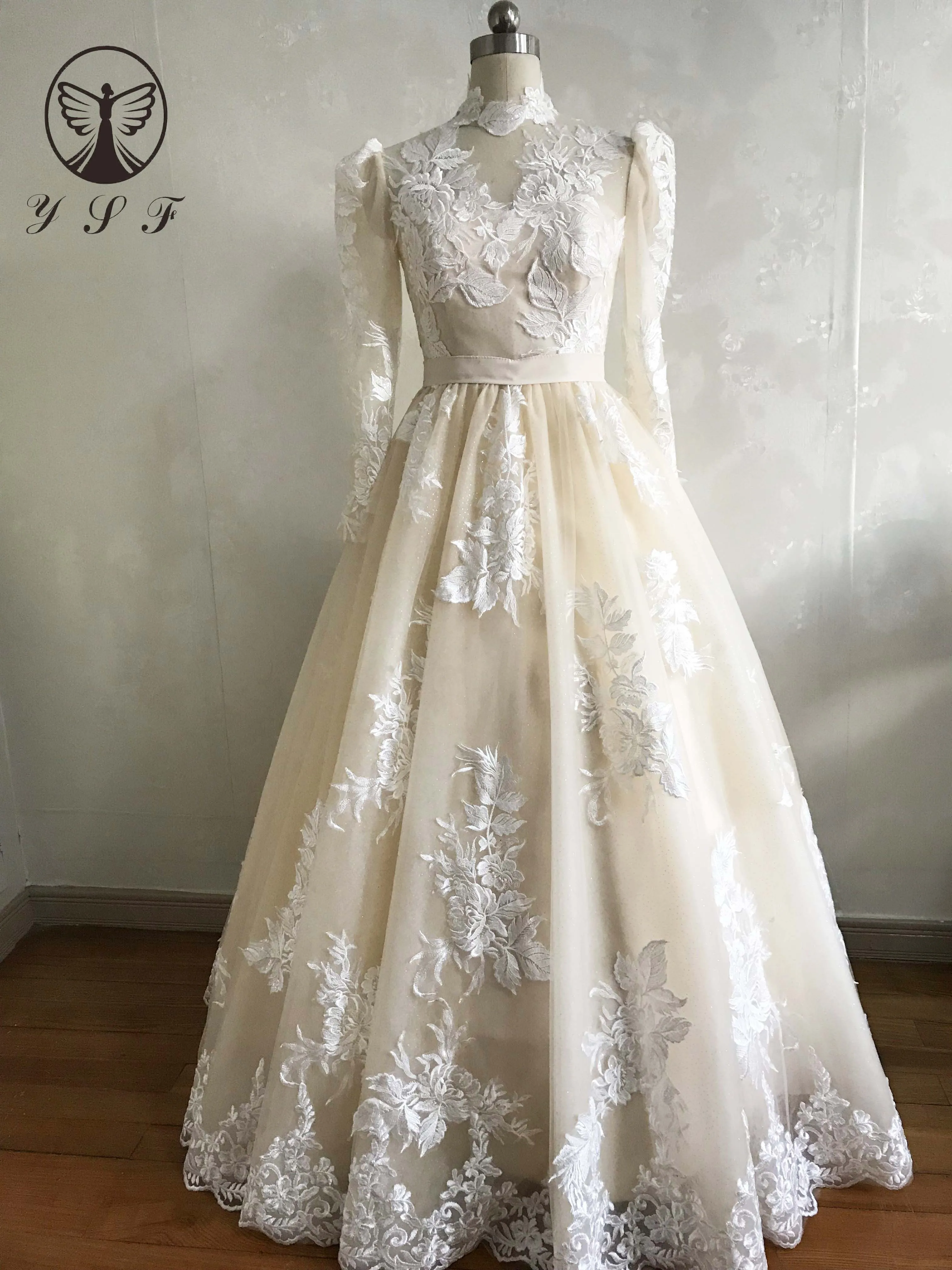 Vestido de novia de manga larga de encaje de cuello alto champán Vintage, línea A, longitud hasta el suelo, hada