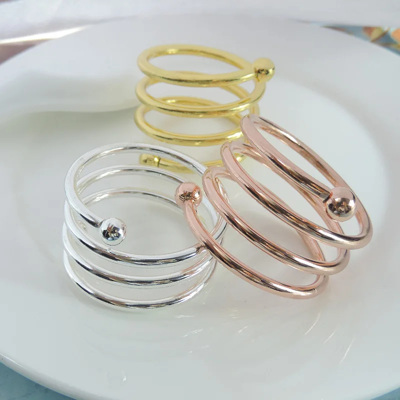 

6PCS Creative Spring Slingshot White Club Napkin Ring Cloth Ring Napkin Buckle Western Food Buckle Napkin Ring Personality