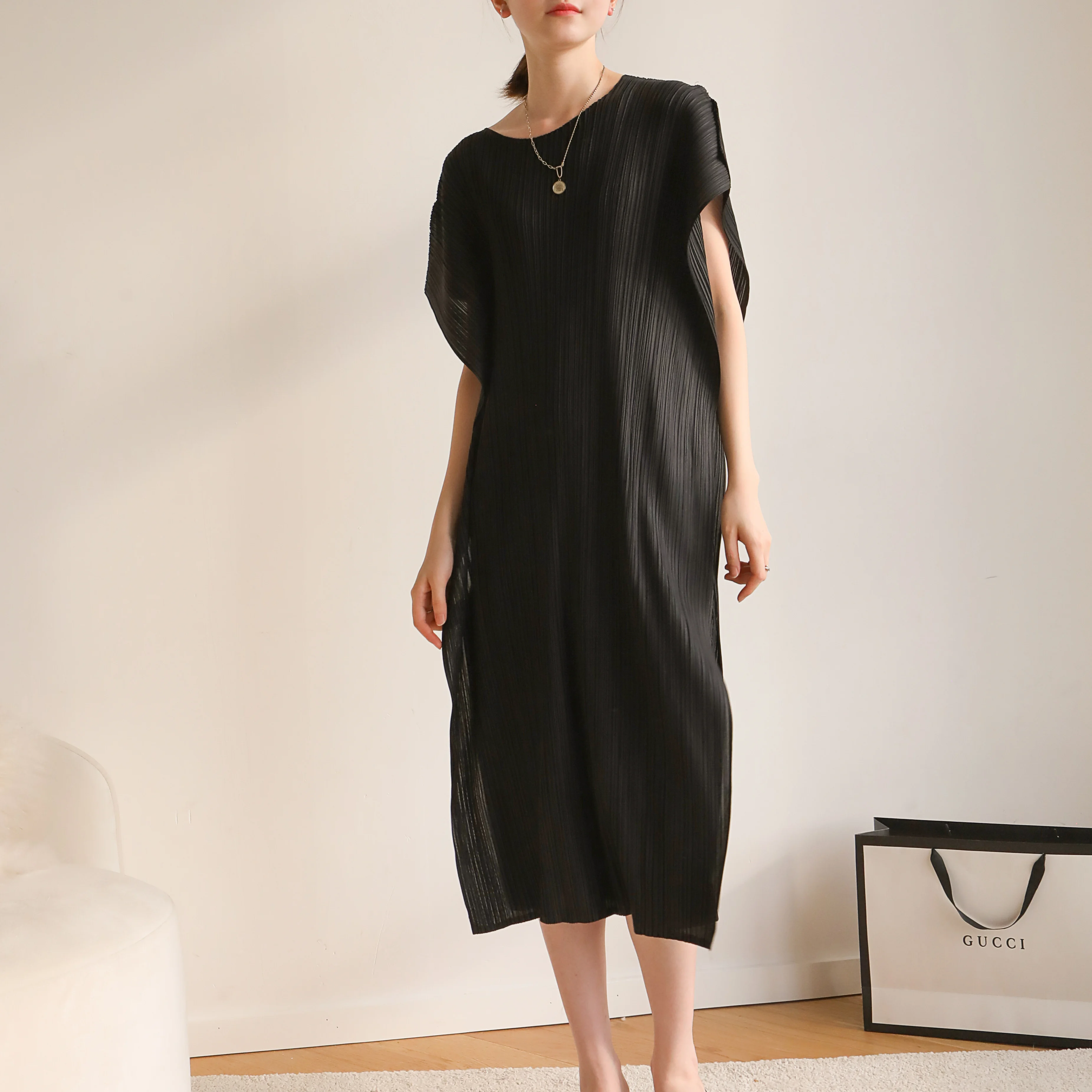 

Summer Miyake pleated fashion street to reduce the age of fat thin can wear a round collar in the long loose dress