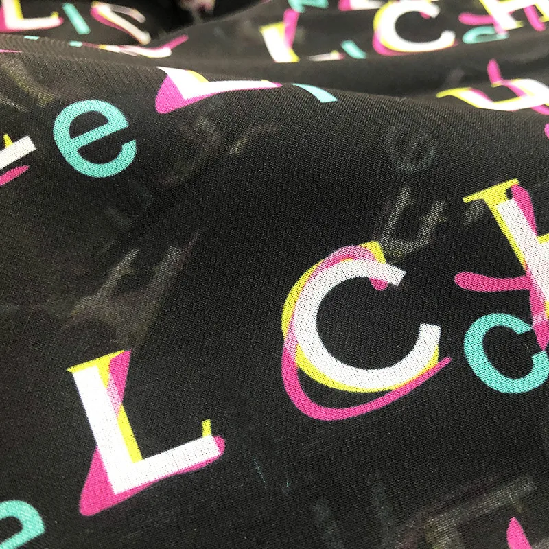 French Brand C Letter Printed Stretch Satin Fabric 100% Polyester Chiffon Garment Fashion Fabric Per Meter for Dress Sewing