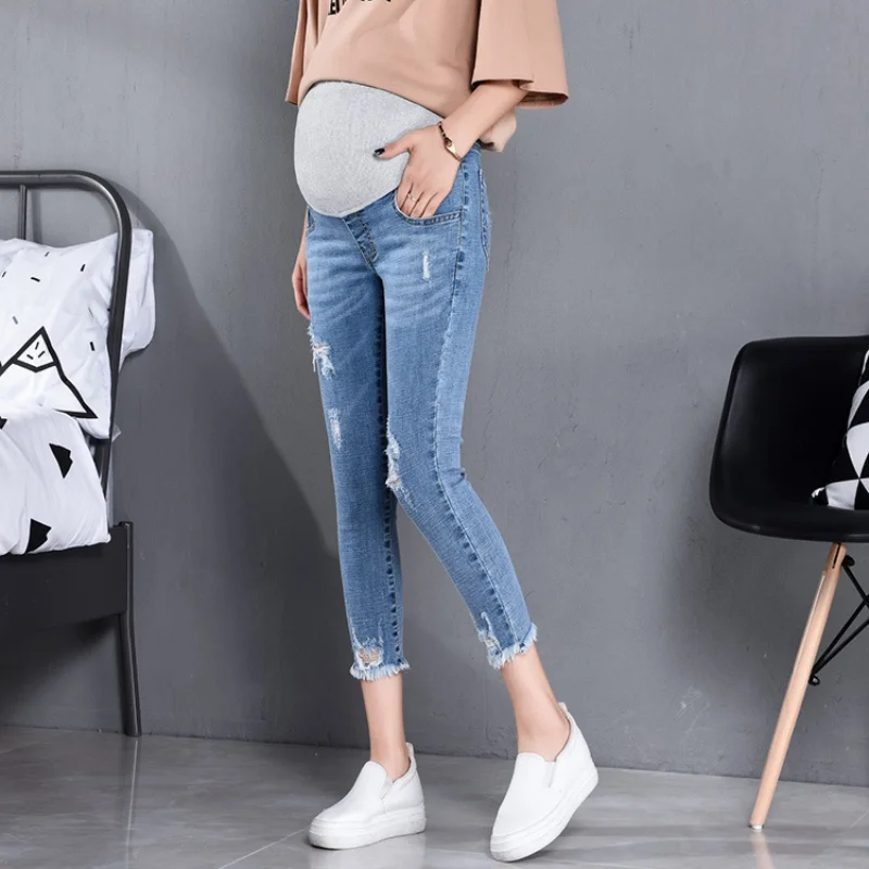 Pregnant women's jeans, autumn style, stomach lift, nine-point pencil pants with small feet, stretch trousers