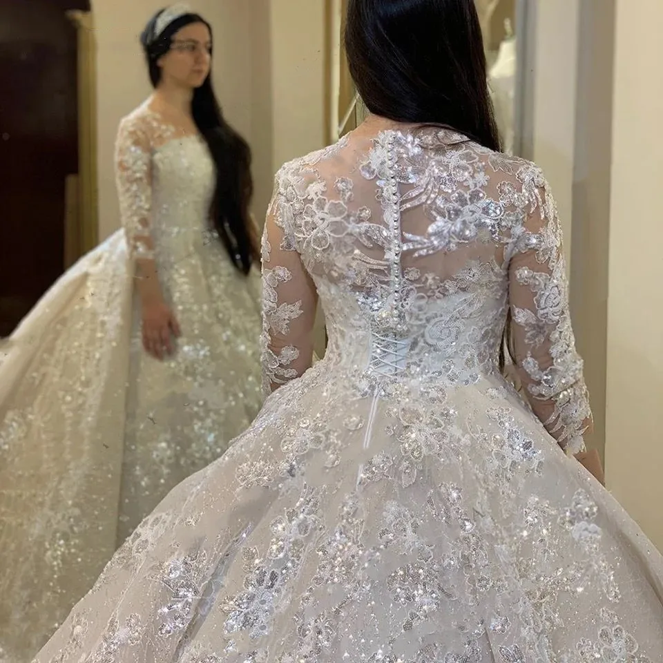 Arabskie koronkowe suknie ślubne Appliqued długie rękawy Ivory O Neck Bride suknie 2021 Marry Muslim Dubai Princess biała suknia ślubna