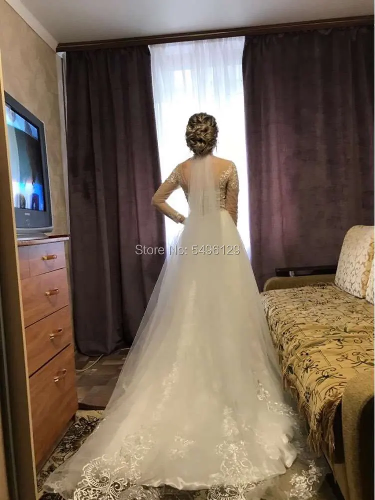 Sexy Sheer z wycięciem linii suknie ślubne romantyczne koronkowe aplikacje z długim rękawem Vestido Noiva suknie ślubne tiul suknia dla panny młodej