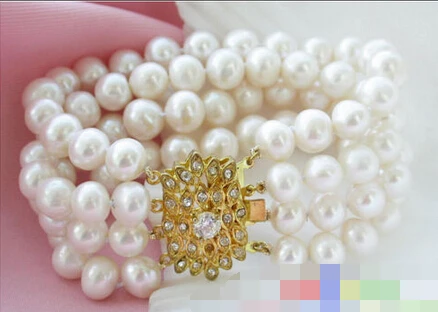 

4ROW WHITE ROUND FRESHWATER CULTURED PEARL BRACELET