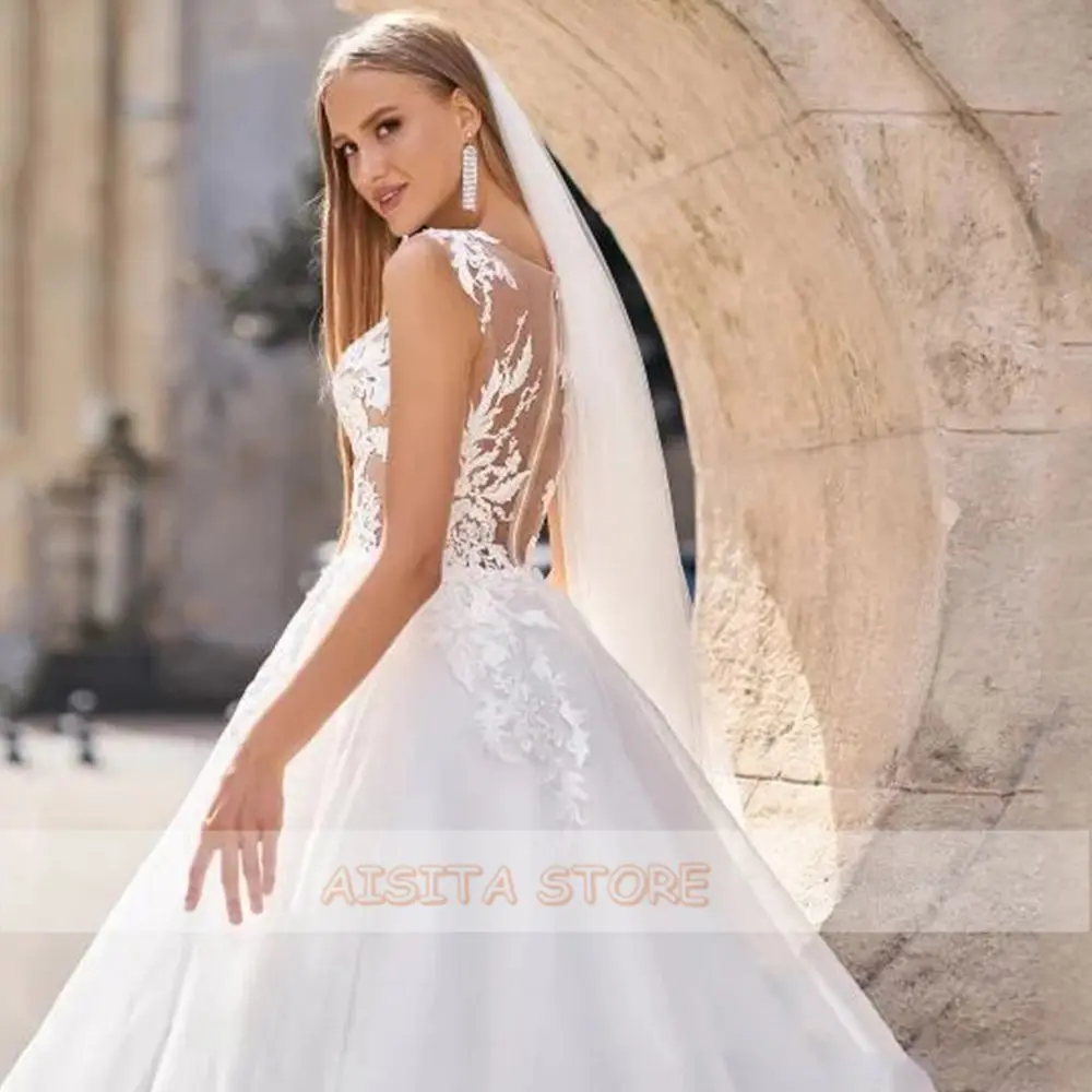 Elegant Wedding Dresses V-hals Mouwloos Kant Applicaties Tulle Button Terug Een Lijn Hof Trein Bruidsjurken Robe De Mariee