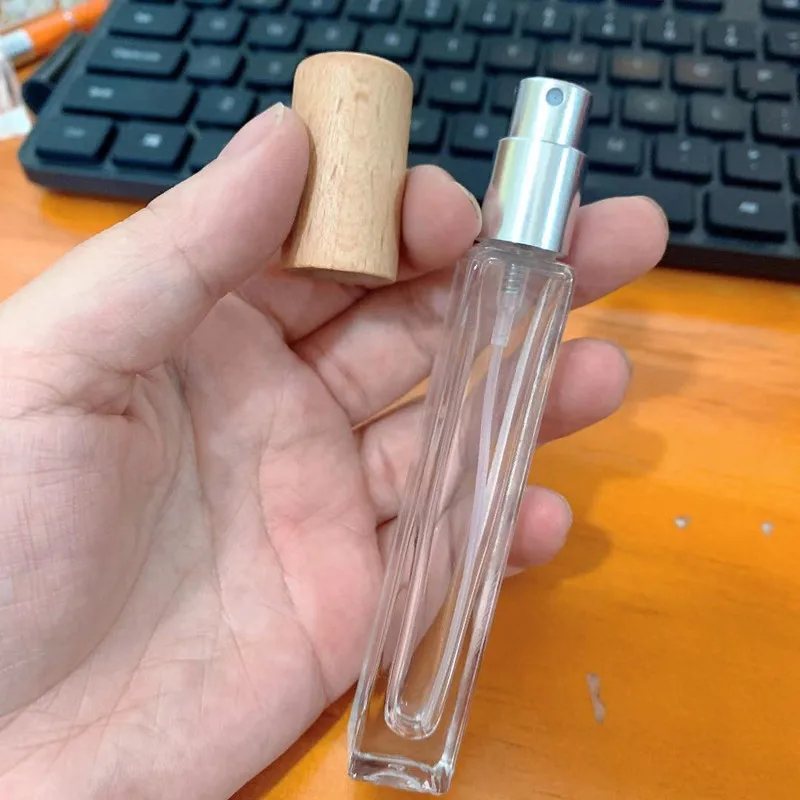Wholesale 10ML Empty Perfume Bottles Wood Cap Thick Glass Spray Bottles High-grade Air Freshener Containers Packaging