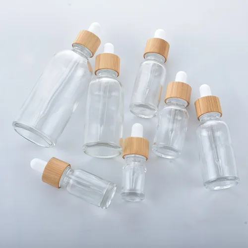 Imagen 2 del producto Botellas cuentagotas de aceite esencial para el cuidado cosmético de la piel, contenedor de pipeta de vidrio de 5ML-100ML, embalaje con tapa de bambú, botella cuentagotas