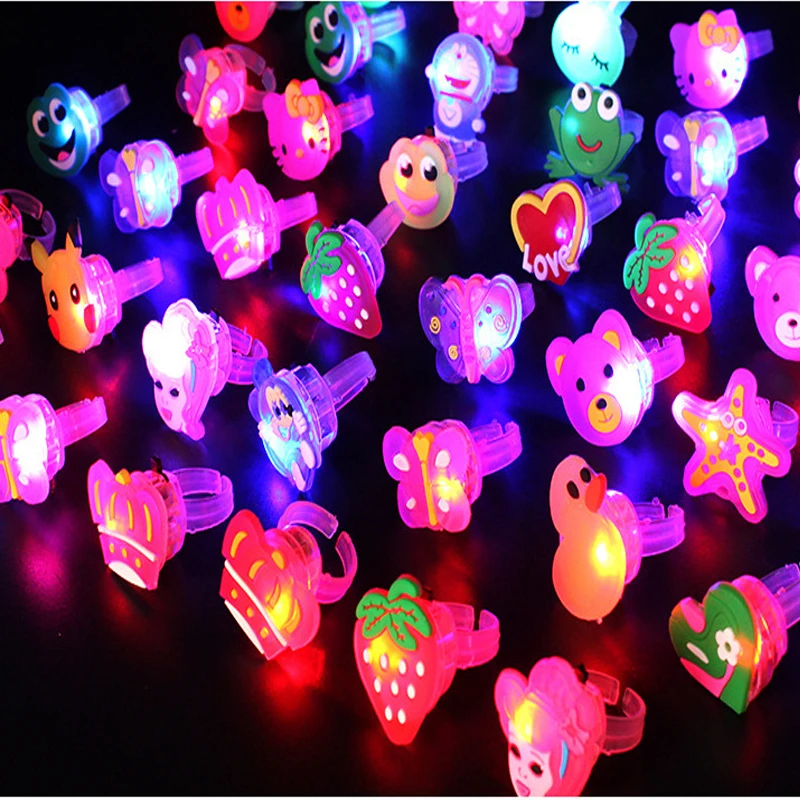 fashion-limited-new-led-dance-100pcs-lot-cute-flashing-lovely-cartoon-rings-various-led-toys-light-up-party-supplies