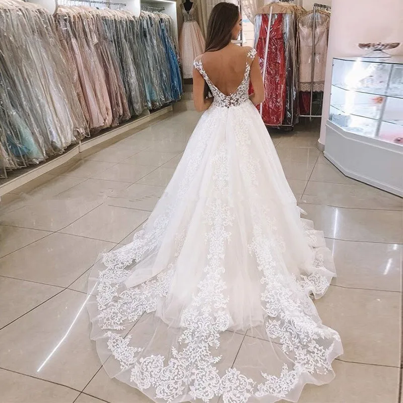 Vestidos de novia con mangas de casquillo y Espalda descubierta, vestido de baile de princesa transparente, Apliques de encaje románticos, vestidos de novia de tul, novedad de 2024