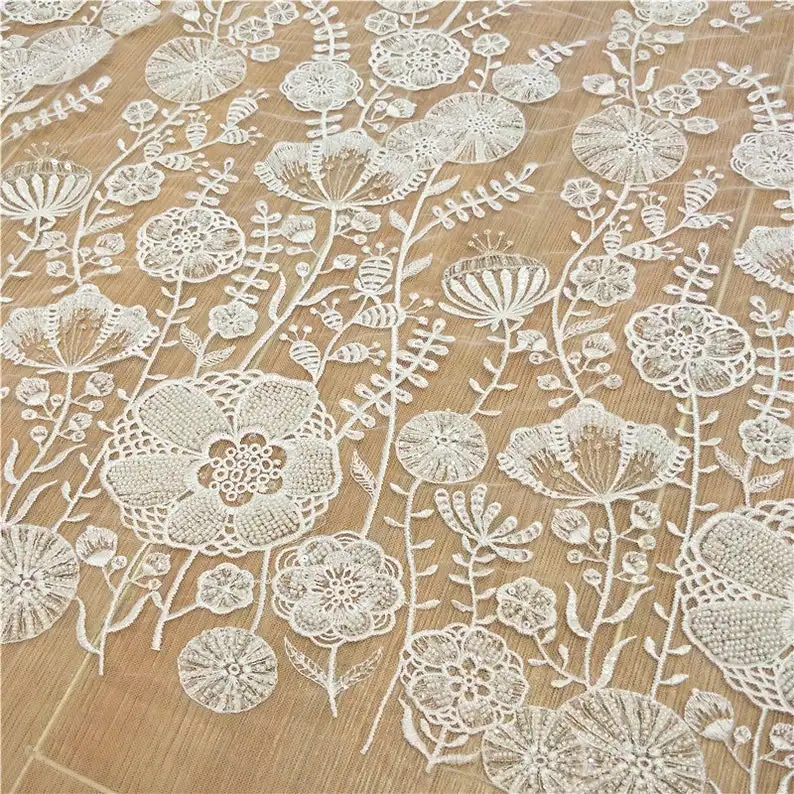 

gorgeous beaded lace fabric with sequins heavy pearls lace fabric wedding/bridal dress lace fabric 1 Meter Long