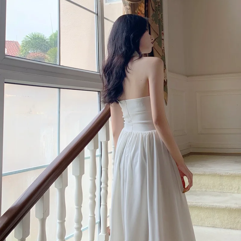 Biała elegancka sukienka koktailowa kobiety Sexy Backless koreański do kolan na imprezę sukienka kobiet bez rękawów, dekolt w serek sukienki Vintage