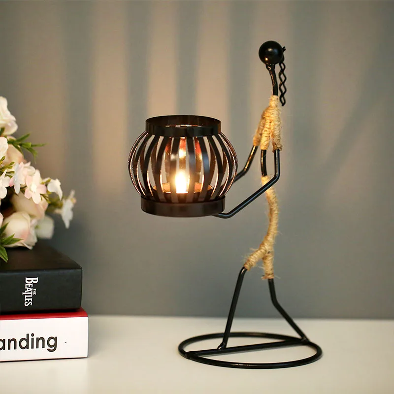 JOYLOVE candeliere in metallo nordico carattere astratto scultura portacandele Decor figurine fatte a mano decorazione domestica regalo d'arte