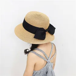 Sombrero de cubo trenzado de paja para niños y niñas, gorro de playa, vacaciones, parte superior redonda, arco al aire libre, bloque de sol, primavera y verano