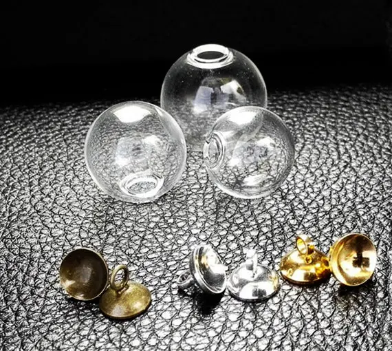 

100sets 14mm-18mm Mini Empty Glass Ball Bottles Pendant Charms Vials Wish Bottle Clear Globe Bubble Crystal Orbs W/ Free Caps