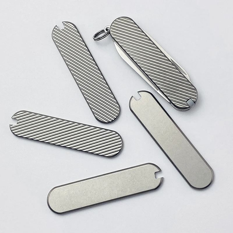 1 par de parches de mango TC4 modificados con Chip de aleación de titanio para fabricación de Material de mango de cuchillo DIY para cuchillo suizo de 58 Mm