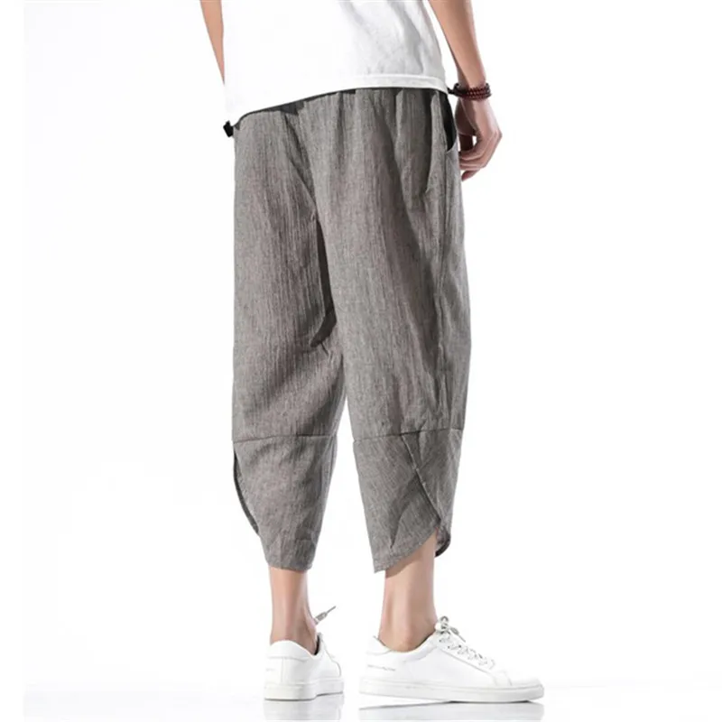 Pantaloni Casual da uomo di marca 2021 estate nuova moda allentato elastico in vita cravatta da uomo in cotone pantaloni corti da uomo pantaloni Hip-Hop Harem