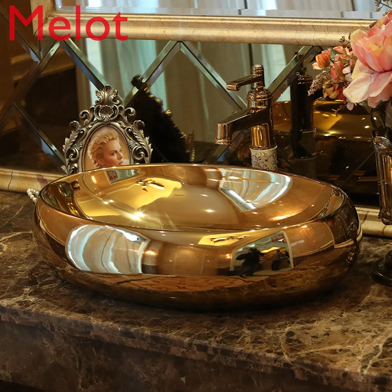 

High-End Luxury European Bathroom Basin Ceramic Oval Wash Basin Golden Art Washbasin Modern Minimalist Bathroom Wash Basin