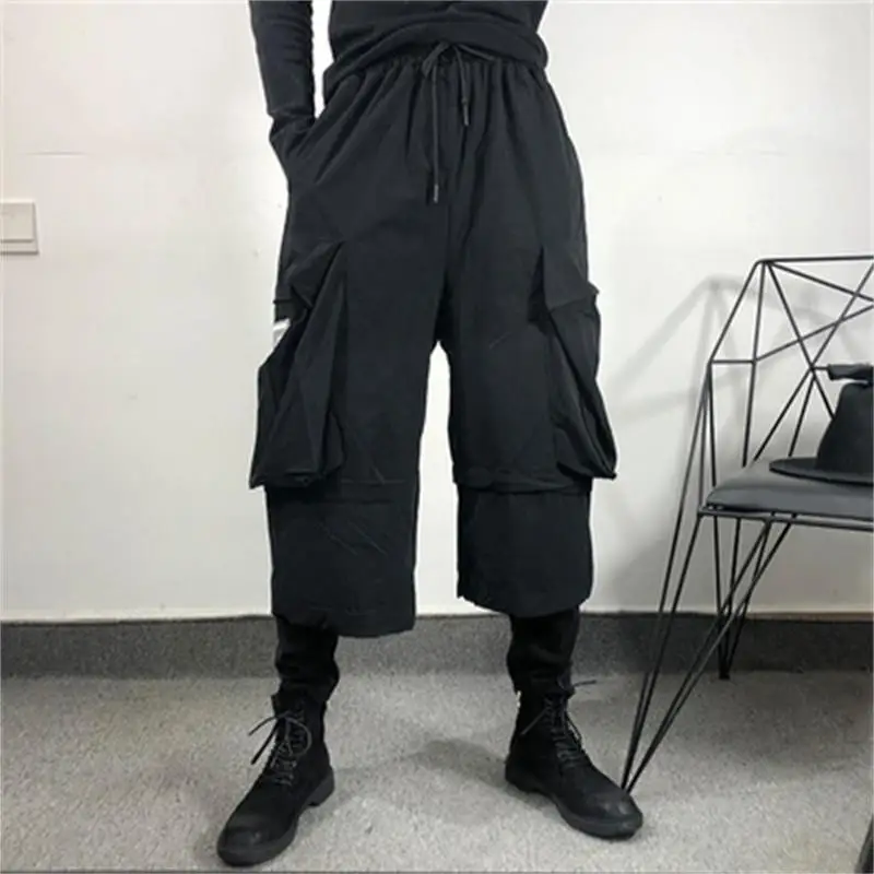 

Original Spring and autumn dark personality men fake two-piece Sports Harun Trousers Street fashion brand hip hop cargo pants