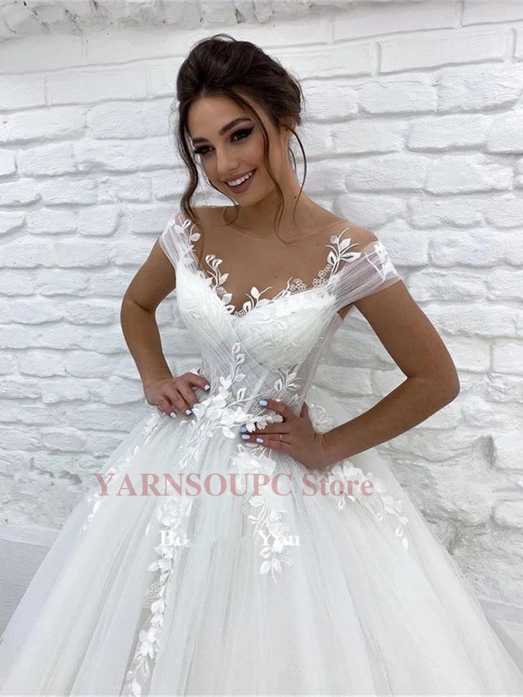 Vestidos de novia de princesa de tul elegantes, cuello transparente, mangas casquillo, apliques de encaje, vestido de novia con