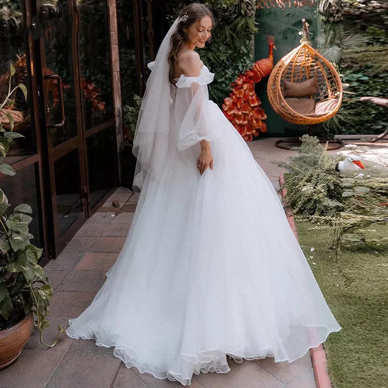 Gaun pernikahan tanpa tali putri 2024 Puff lengan panjang Off Shoulder Court Train Vestido De Noiva Organza gaun pengantin sederhana