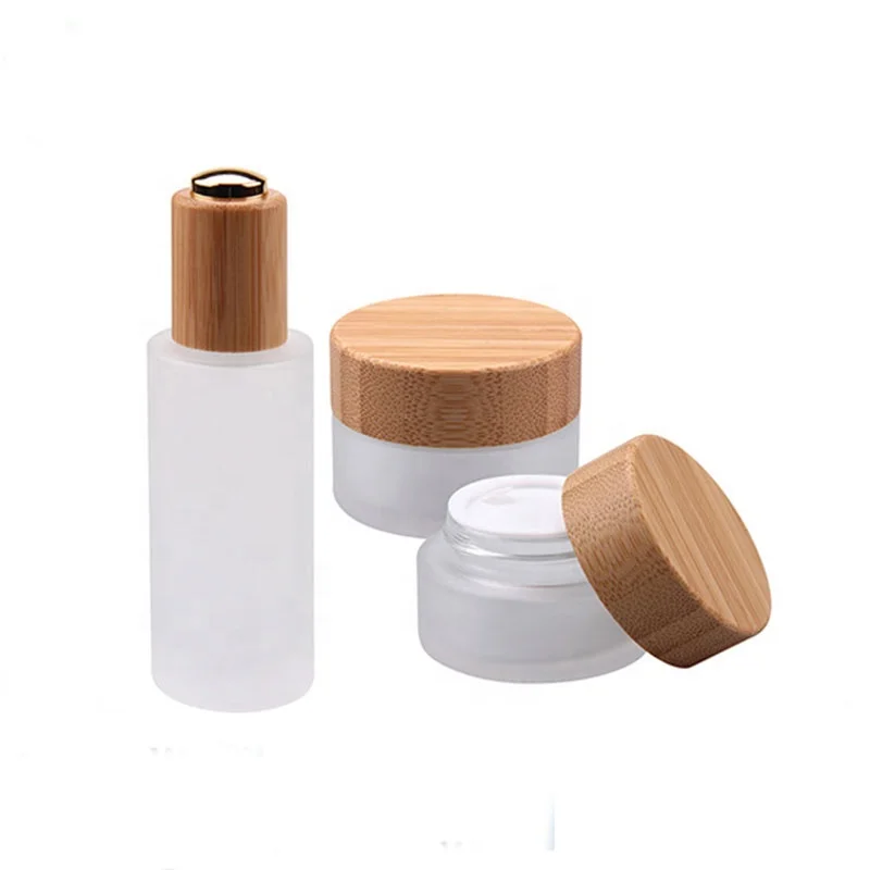 

Wholesale 5g 15g 30g 50g 100g 150g 200g Recycled Frosted Glass Jars Natural Bamboo Cosmetic Packaging glass jar with bamboo lid