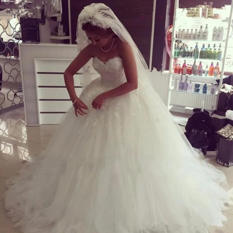 Abiti da sposa eleganti corsetto a cuore con abiti da sposa in rilievo abito da sposa personalizzato con applicazioni in Tulle bianco/avorio