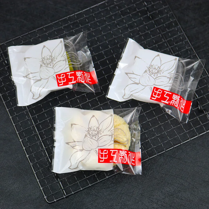 100pcs/lot New Year White Frosted Splicing Snowflake Crispy Seal DIY Packaging Bag Transparent Blooming lotus Gift Goodie Bags