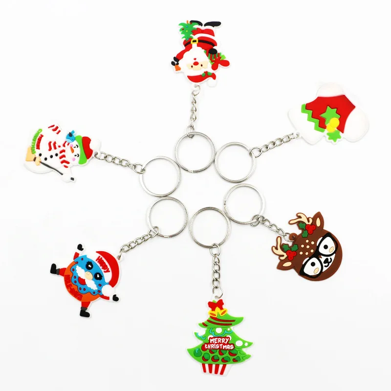 Wholesale 100pcs Cartoon Christmas Tree Socks Snowman Deer Santa Claus Key Chains pvc Xmas Promotional Gift Keyrings