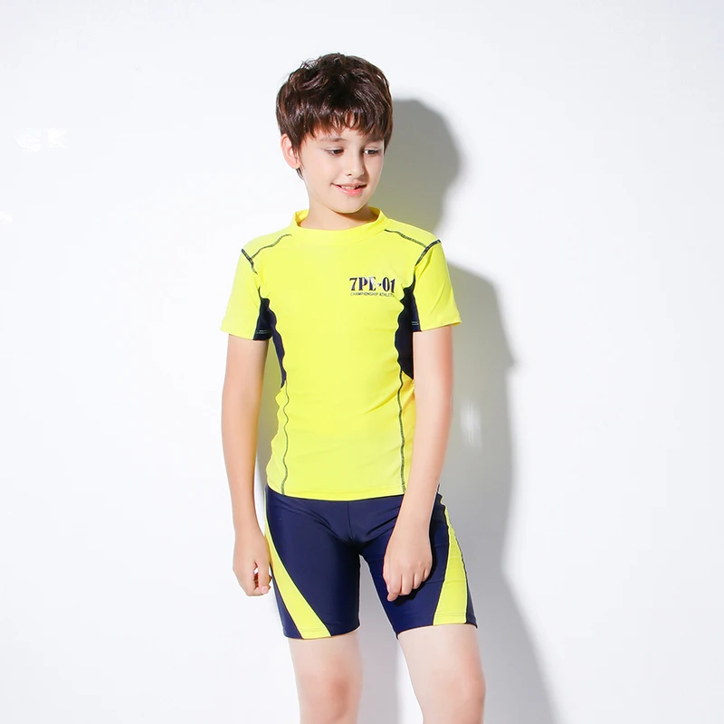 Teenage boys wear two-piece swimwear children\'s sportswear short-sleeved yellow shirt and blue shorts