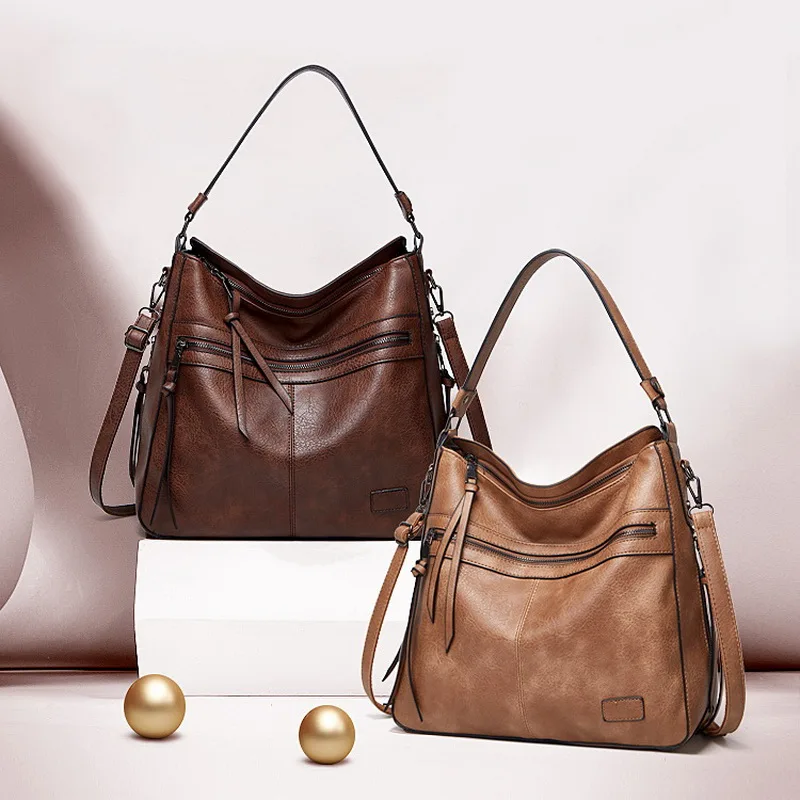 Sac à main en cuir PU avec pompon pour femme, sac à main vintage, sacs initiés à la mode, fourre-tout de luxe, hiver 2024