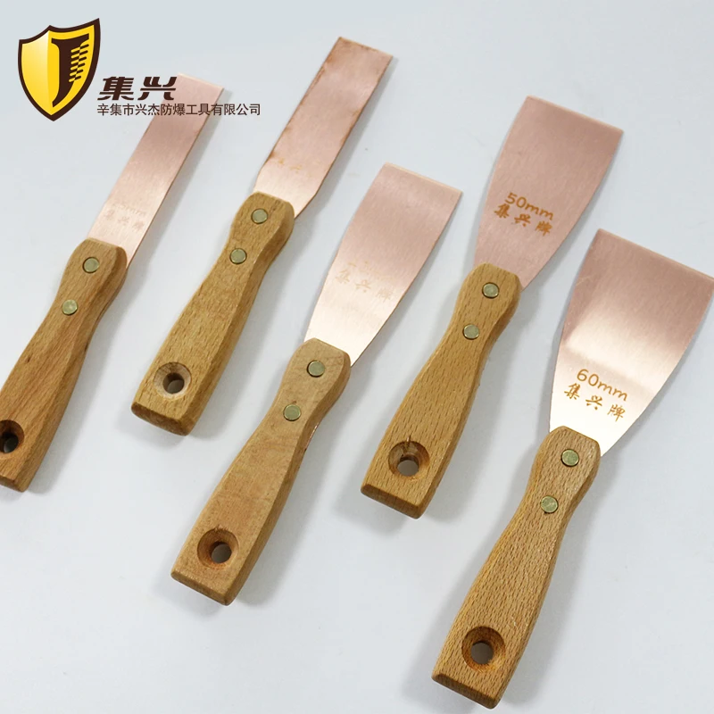 

Red Copper Non sparking Putty Knife with wooden handle, Tool for Cleaning,