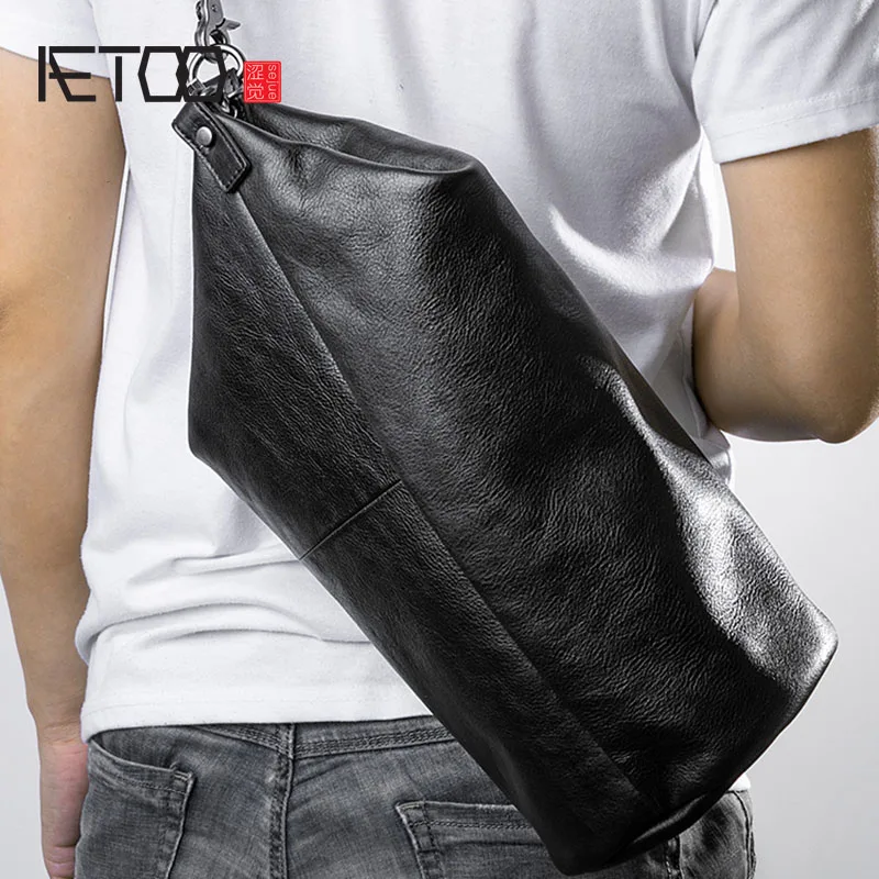 AETOO Personality one-shoulder slanted bag, head leather bag, leather cylinder bag, fashion trend men's bag