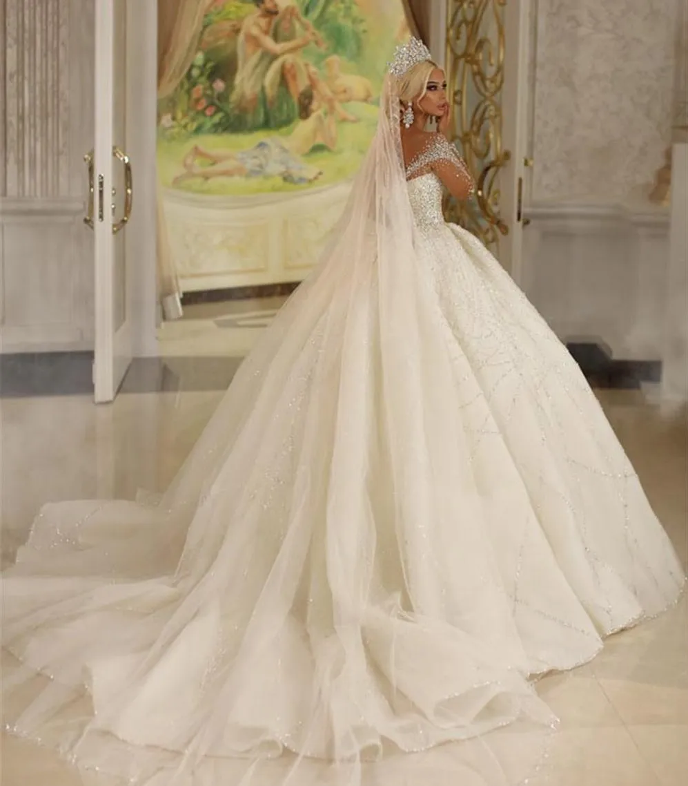 Lusso nuovo arrivo Dubai cristalli principessa abito da sposa bianco 2023 maniche Illusion perline gonfie abito da sposa corte treno