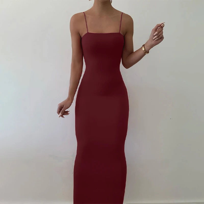 long dress with corset belt Black jersey hooded dress with a metal visible corset belt