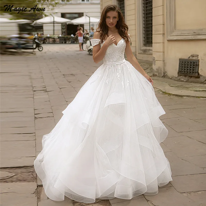 Magiczne Awn nowe suknie ślubne Off The Shoulder 2021 koronkowe aplikacje księżniczka bufiaste suknie ślubne Lace Up powrót Vestidos Branco