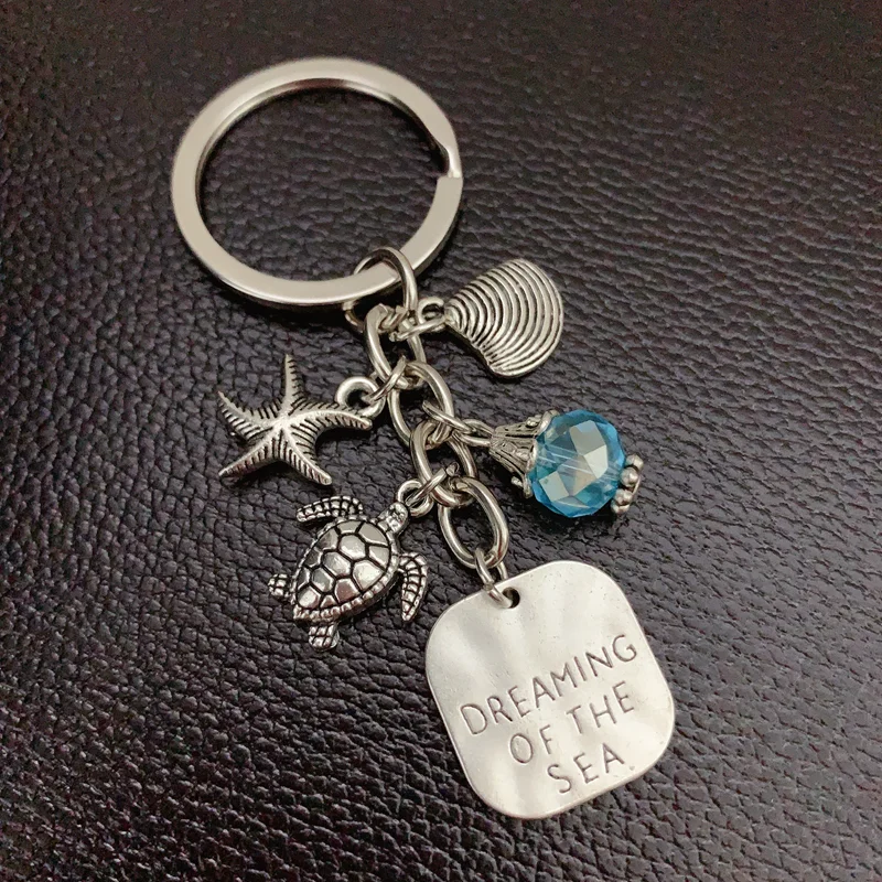 1 peça de jóias oceano sonho estrela do mar chaveiro chaveiro escudo pingente chaveiro oceano sonho senhora presente do feriado