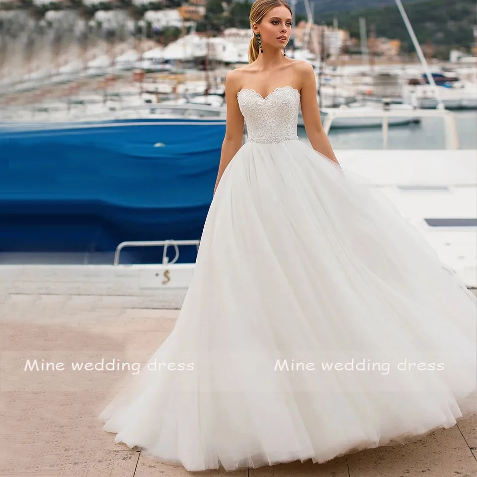 

Sweetheart Lace Applique Beads Belt Princess Tulle Wedding Dress A-Line Backless Corset Designs Wedding Gowns