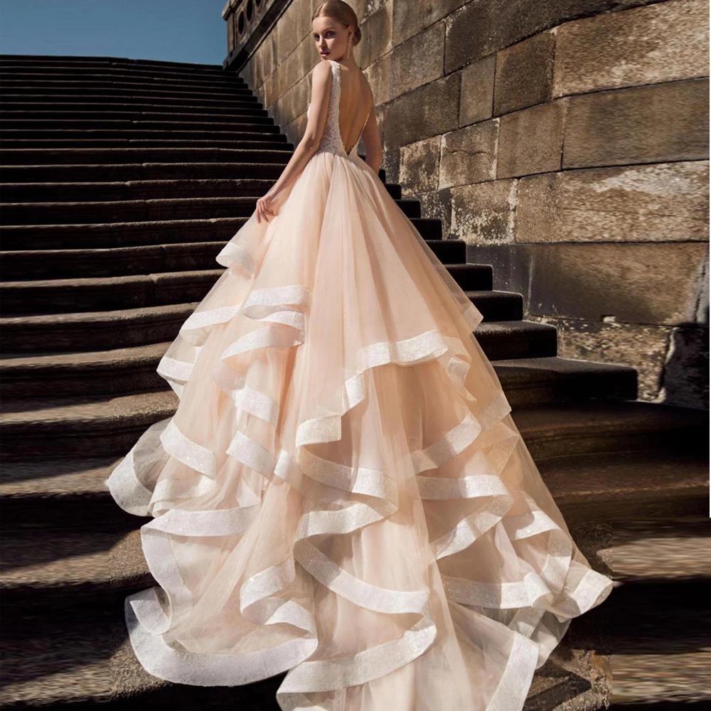 Romantic Champagne Wedding Dresses Vestido de Novia Customized Sexy Backless Ball Gown Bride Dress with Ruffles